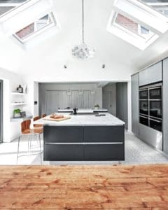 Modern kitchen with white counter surface