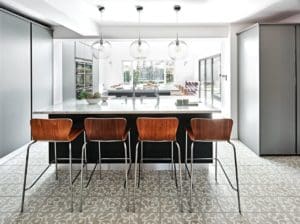 beautiful kitchen with 4 island and chairs