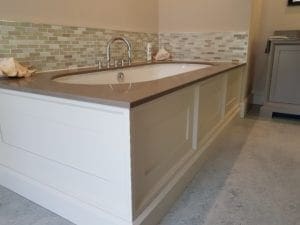 Bespoke bath with modern granite surface