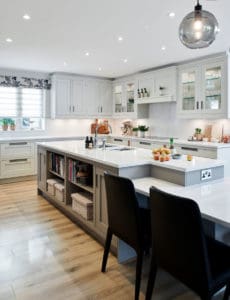 Bespoke grey kitchen with white marble surfaces