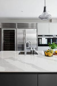 White marble counter tops and cabinets