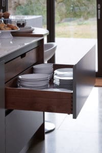 Bespoke kitchen draws filled with plates