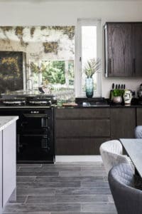 Black kitchen units with black marble units