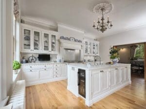 White cupboards and white marble surfaces